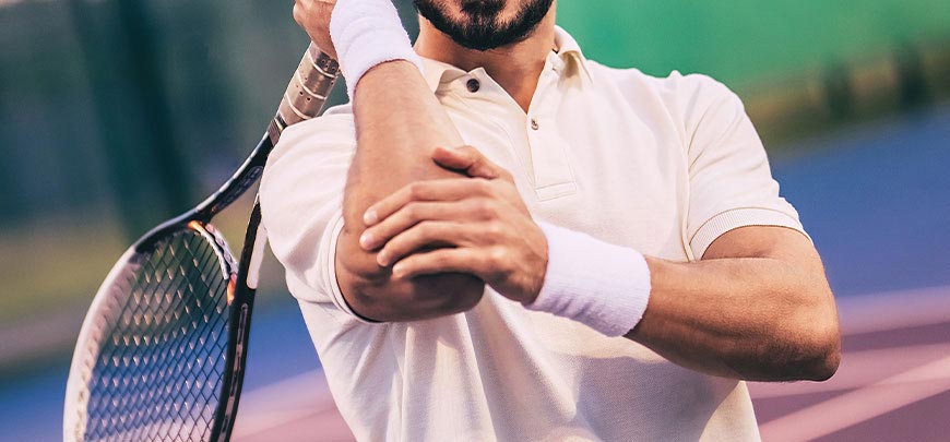 patient needing tennis elbow treatment in Dublin