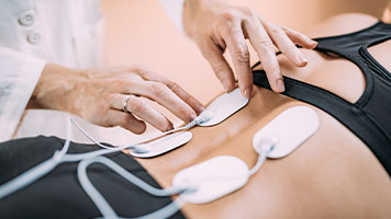 patient getting electrical muscle stimulation in Dublin CA